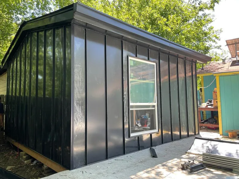 Black standing seam metal wall panels for Roof Inspection in Ellisville