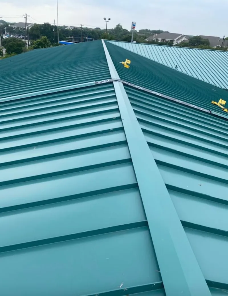 Green commercial metal roof ridge and valley for Metal Roof Repair in Ellisville